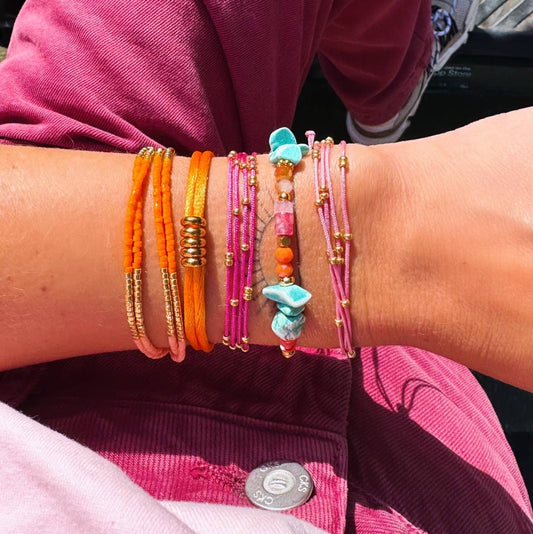 BRACELET EN PERLES - orange