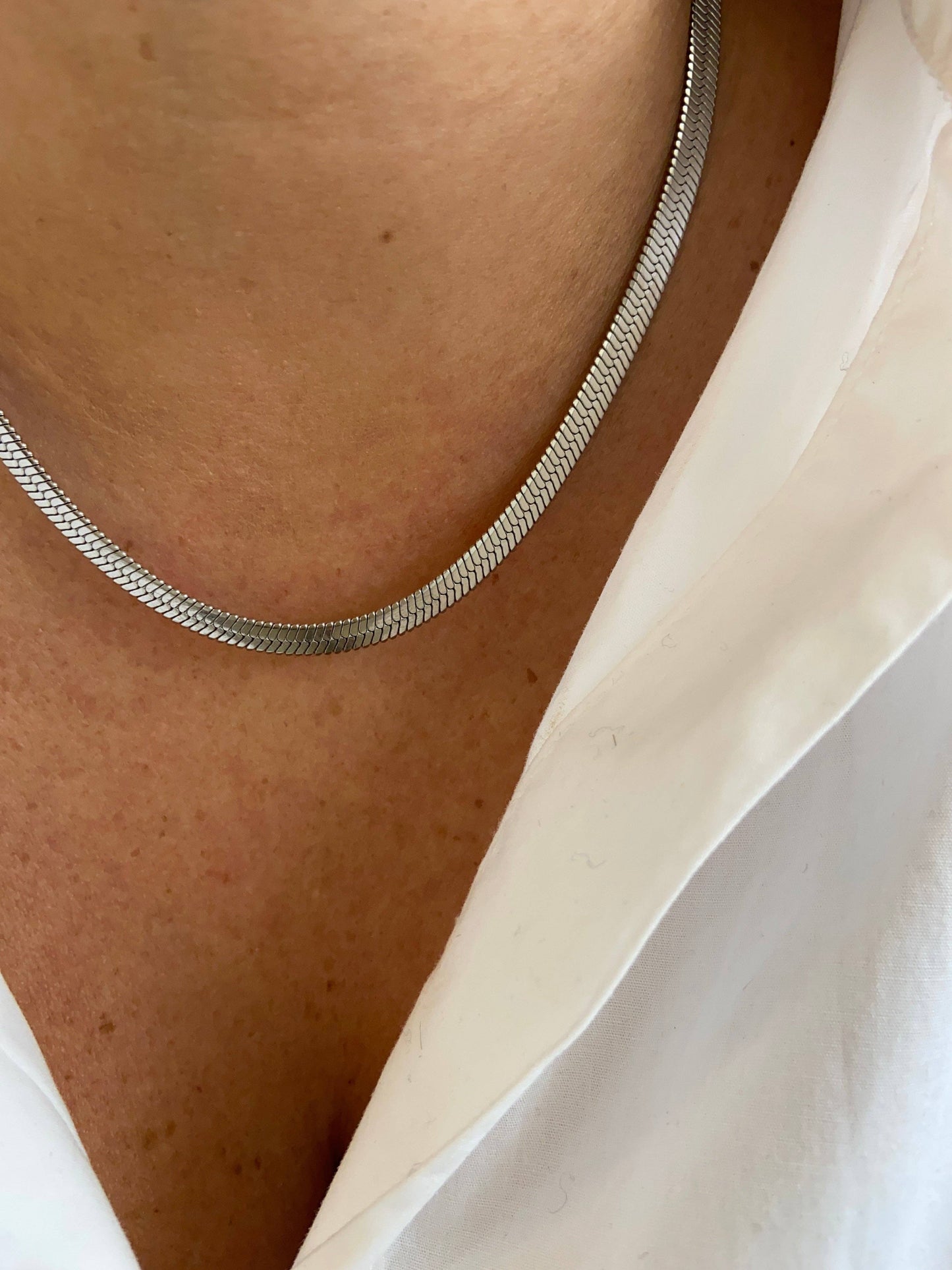 COLLIER EN ACIER - Doré