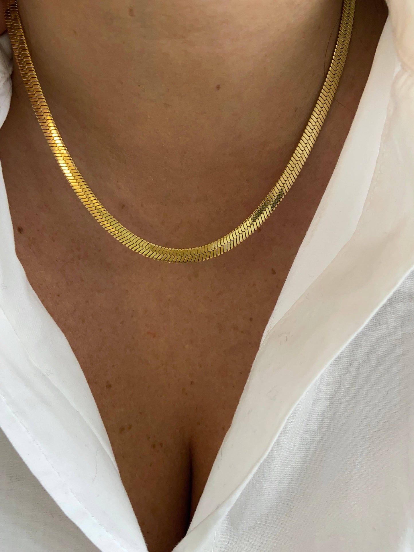 COLLIER EN ACIER - Doré