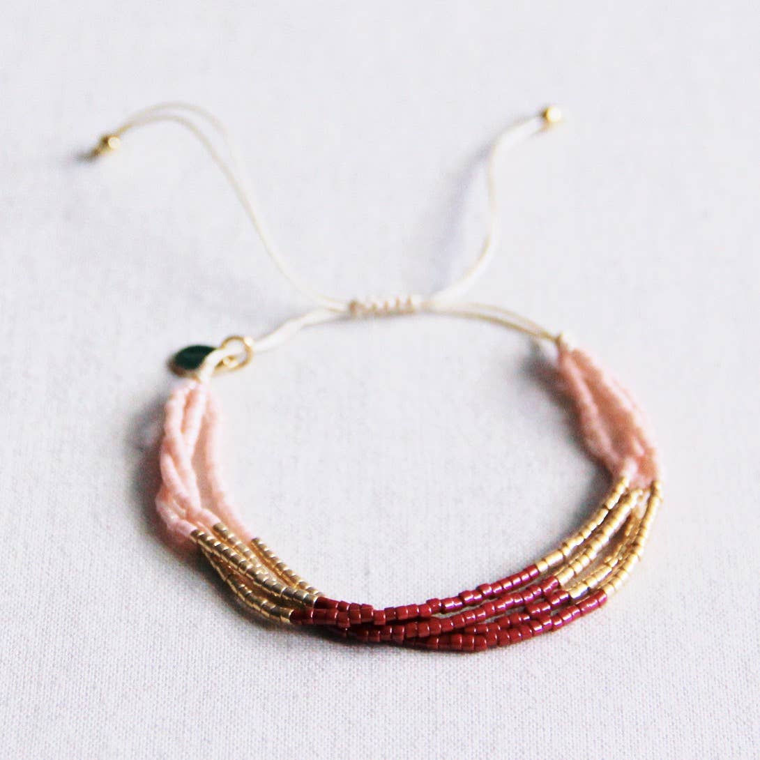 BRACELET EN PERLES - bordeaux/lnude/doré