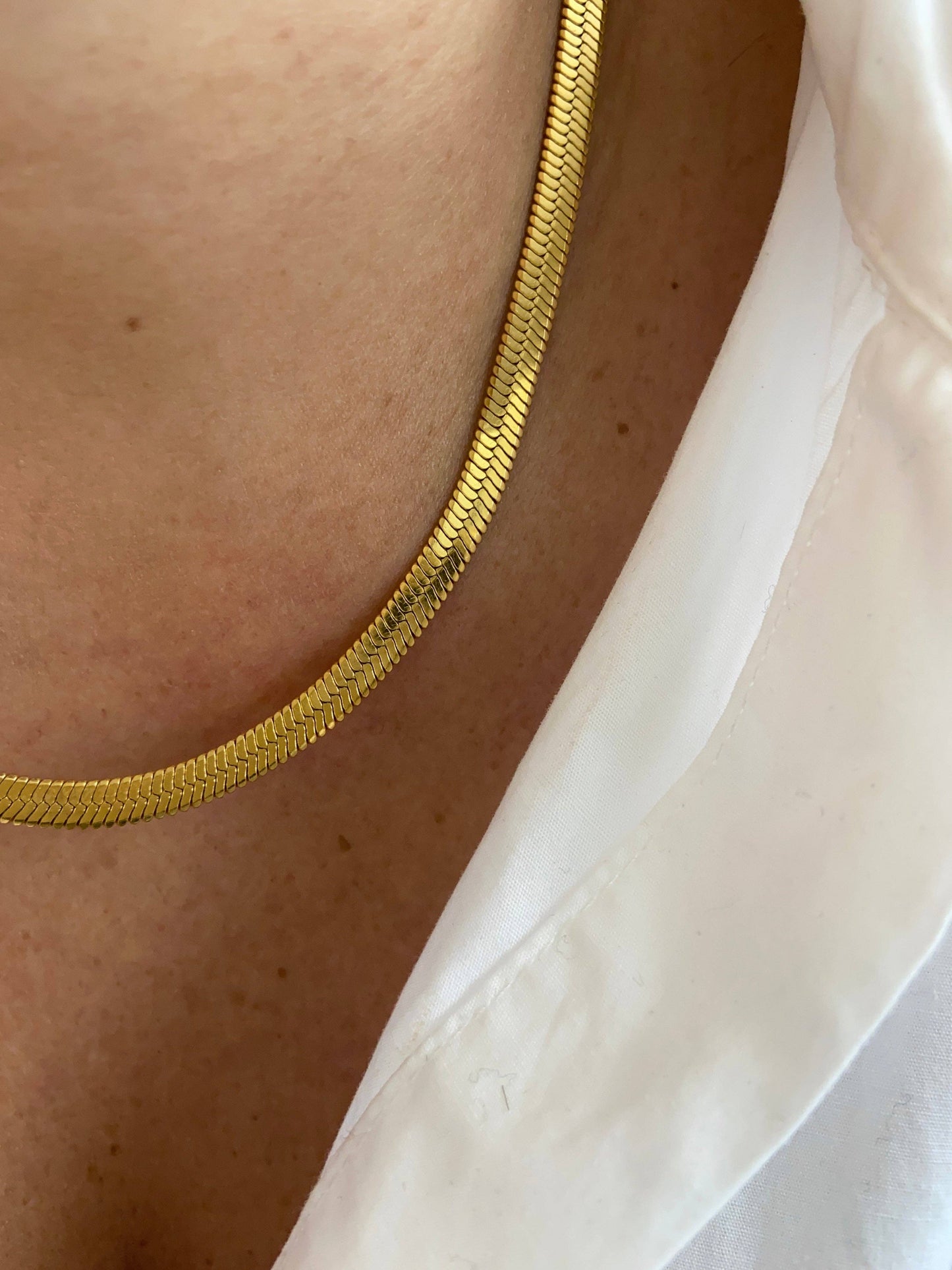 COLLIER EN ACIER - Doré