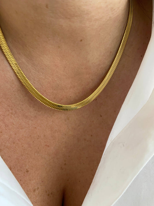 COLLIER EN ACIER - Doré