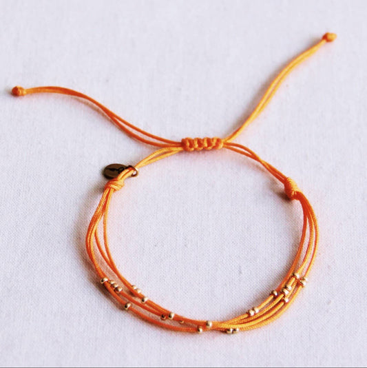 BRACELET EN PERLES - orange