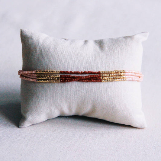 BRACELET EN PERLES - bordeaux/lnude/doré
